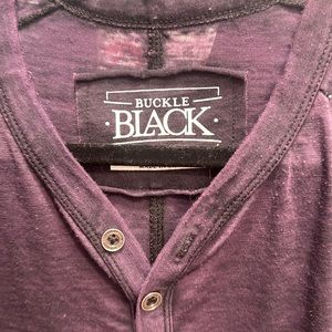 Buckle Black, XL  3  buttons in the front short sleeve. Lightweight T-shirt.